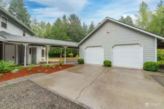 Never get wet taking groceries or the littles to the house with this one of a kind breeze way. The 2 car garage is large enough for any mechanic or wood worker in your family.