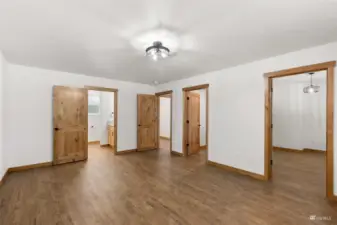 Massive primary bedroom with attached bathroom, walk-in closet, and office space. Wow!