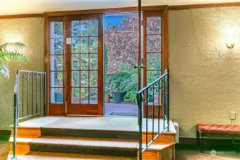 Classic mahogany french doors off the lobby lead to the sunny deck, and into the big and incredibly rare garden.