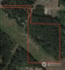 Split into 3, 5 acre lots, build a home on each lot. Or hold for future unzoning happening in area.