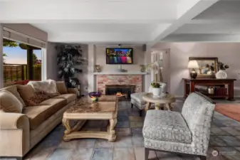 Lower level  living / family room with gas fireplace