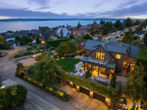 Set high off street for privacy and views, this charming Tudor-style home had a studs in & out remodel completed  in 2002 winning both the Master Builders Association award for a "Major Remodel" & Seattle Home Magazine's "Home Of The Year"