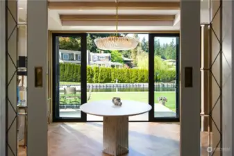 Formal Dining with leaded sliding doors and French doors to patio