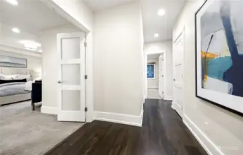 This unit features gracious wide hallways and art walls.