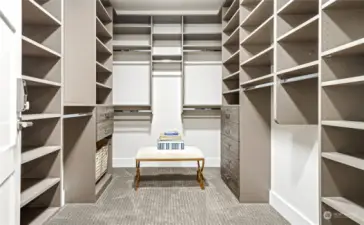 Newly remodeled, the primary suite's new custom closet build-out is stunning.