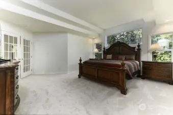 HUGE LUXURIOUS PRIMARY MASTER SUITE W/CUSTOM CEILINGS/ WALL TO WALL NEW CARPET/ FRENCH DOORS