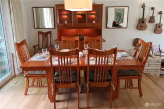 The dining room is large enough for a big table & sideboard.  The living room & dining room feature coved ceilings. There is a hidden pocket door between the dining room and the kitchen.  The entry & kitchen also have a hidden pocket door.