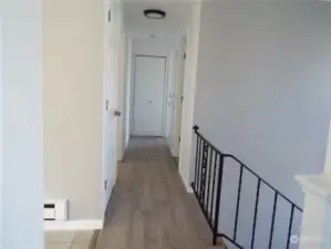 hallway to bedroom and bathroom