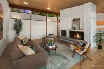 Clerestory windows, a staple of mid century design, and vaulted ceilings bring added light into the airy space.