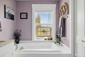 Did we say views from every room? Yes! This spa-like bathroom features a large soaking tub in addition to a custom subway tiled shower and double vanity.