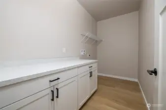 Utility room with counters for folding clothes