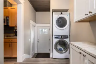 Mudroom and laundry room with built-ins