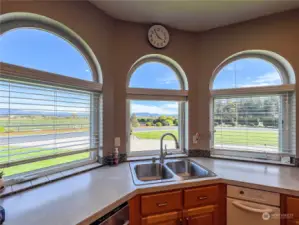 Stunning views of the mountains from the kitchen sink and prep areas.