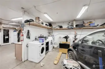 Laundry room in detached garage.