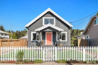 Level front and back yard with easy parking right at your picket fence gate