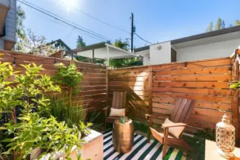 Your private safe haven - a beautiful back patio. Morning coffee, afternoon tea, happy hour, and a space to make green thumb dreams come true - you can have it all!