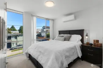 Master bedroom, a quiet oasis with amazing views of the city.