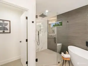 Bathroom wired for bidet. Smart mirrors,   radiant floors,  and free-standing tub.