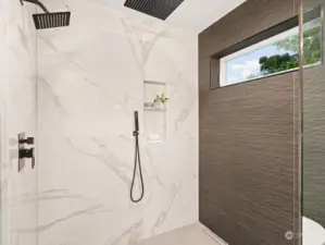 Radiant floors extend into tiled shower with Smart Thermostat.