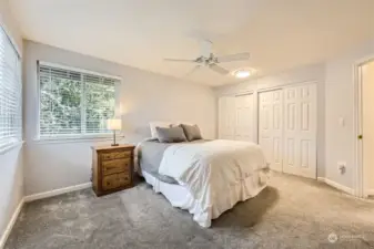 COMFORTABLE SECOND BEDROOM IS ATTRACTIVE AND BRIGHT.