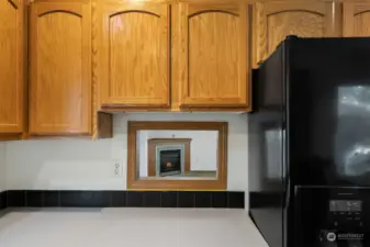 Convenient pass-through cut-out between Kitchen and Dining  allowing for easy entertaining.