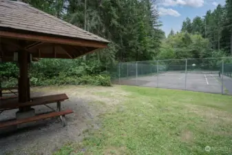 Gazebos with picnic tables and bbq pits. Sports courts including basketball and pickeball.