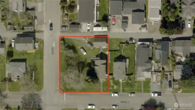 This oversize corner lot has SO MUCH to offer!