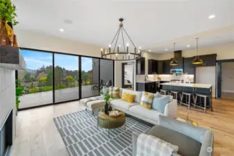 Elegant living room with quality wood flooring, gas fireplace, open to kitchen and dining rooms. Walls of windows showcase the incredible views, embrace the wonderful light and lead the way to the infinity deck for outdoor entertaining!