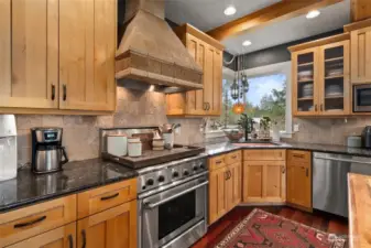Custom cabinets made with solid wood, granite slab counters, simply stunning!