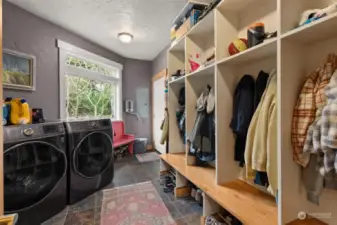 Oversized mudroom w/ built-in shelving. Washer and Dryer included!