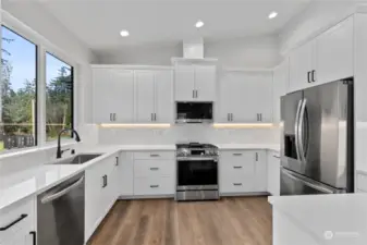 Stainless Steel appliances and custom cabinent lighting.