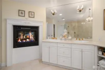 Dual sided fireplace in primary bedroom