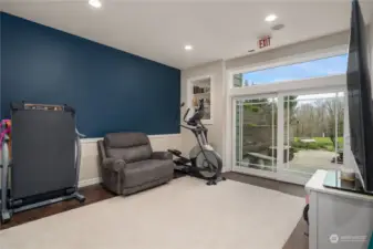 Lower level exercise/flex room with slider to patio