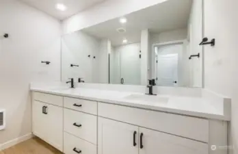 Primary ensuite bath with walk-in shower and separate water closet
