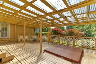 Covered deck with hot tub