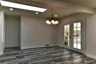 Dining room with French doors to covered deck and hot tub
