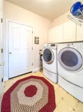 Laundry room with access to the garage.