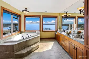 The primary bathroom doesn't lack any view,  With these three windows you see it all.  Perched above Puget Sound, most say these are better views then waterfront properties