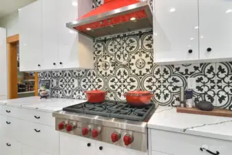That backsplash adds spice to the space.