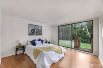 Large Bedroom with Sliding door to back green space