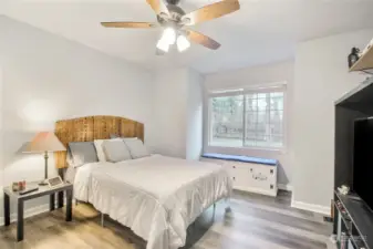 Additional bedroom with a ceiling fan and alcove.