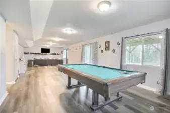 Lower level rec room in the daylight basement can easily accommodate a pool table or home gym.