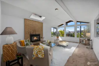 Bright and open west facing living room. Enjoy magnificent sunsets.