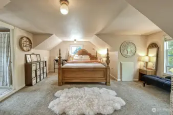 Huge master bedroom with sweeping views from every window. Cozy up in your window nook with a good book and look at the views.