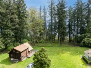 Two waterfront homes on nearly 10 acres!  Remodel or build new?  There are so many possibilities!