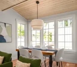 The cozy dining room space features plenty of room for a large table and dinner for six.
