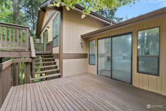ENTRY LEVEL DECK OFF THE PRIMARY BEDROOM | Enjoy your own deck off the main level primary suite.