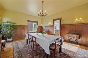 You will fall in love with the original wainscoating and lighting in this room.