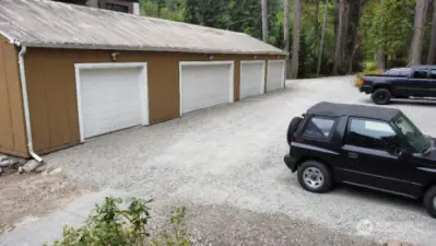 6 car, 4 Bay detached garage off front driveway.