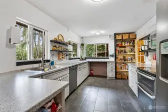 The kitchen has been completely remodeled. All the modern conveniences and modern colors. Slate tile flooring, double oven, light and bright with lots of counterspace.